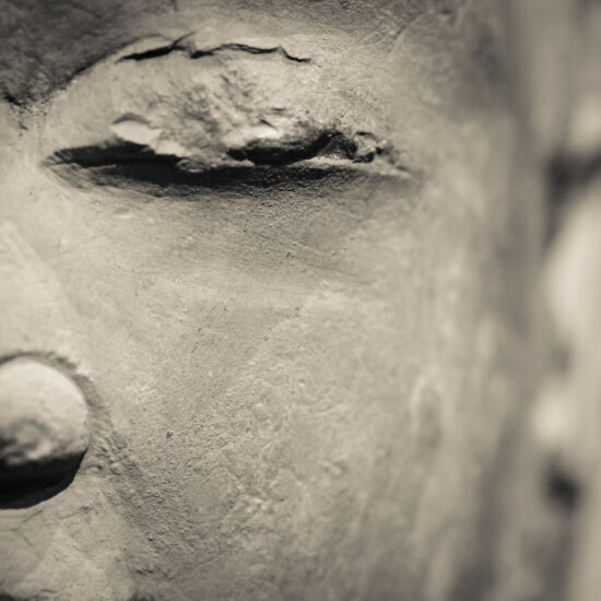 religion stone sculpture of buddha closeup